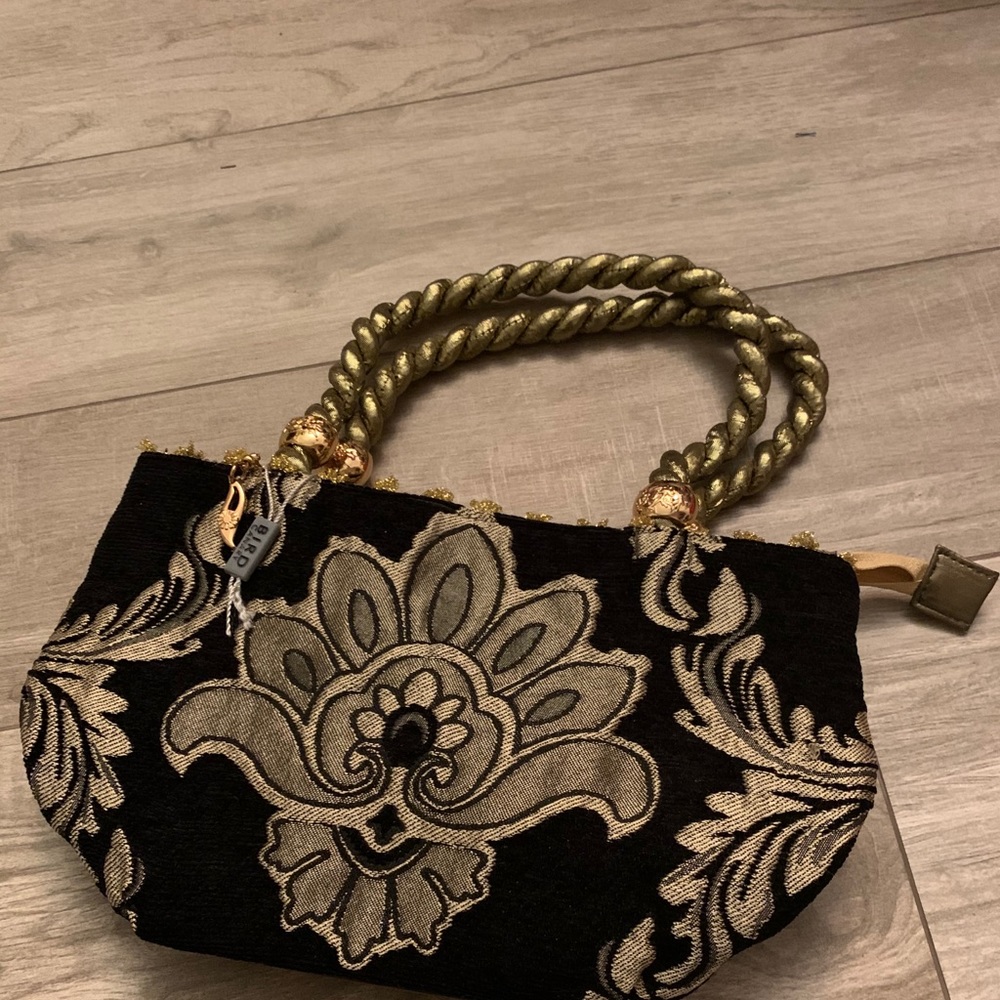 Brand new! Elegant evening bag made by Bird